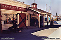 My wife standing in front of the Maritime Museum at Fisherman's Wharf. San Francisco, CA 'Minolta X700 35mm SLR' (Click for larger view)