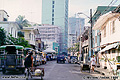 This typical view of what a street in Manila looks like. The jeepneys parked along the left side of the street are a main part of the transportation system in Manila. Manila, Philippines 'Minolta X-700 35mm SLR' (Click for larger view)