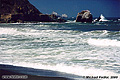 In the second Pacifica picture, waves break over the rocks as the tide comes in. Pacifica, CA. 'Nikon F100 35mm SLR' (Click for larger view)