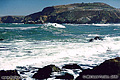 In this fourth photo in the Pacifica series you can see several surfers. One is standing in the center of the photo. You will probably need to click on this image to view the larger version in order to see the surfers. Pacifica, CA. 'Nikon F100 35mm SLR' (Click for larger view)