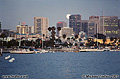 I arrived at the harbor just in time to see the moon peeking from behind the San Diego skyline. San Diego, CA 'Minolta X700 35mm SLR' (Click for larger view)
