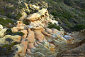 This unsusual formation could only be viewed from a distance standing on one of the upper edges of the cliffs. If I had more time I might have been able to find a was to hike down to the unusual spot. Torrey Pines, CA 'D70 Digital SLR' (Click for larger view)