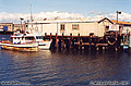 Well-used boats at one of the docks at Fisherman's Wharf. San Francisco, CA. 'Minolta X700 35mm SLR' (Click for larger view)