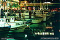 This photo of some of the boats along Fisherman's Wharf was taken at night. San Francisco, CA. 'Nikon F100 35mm SLR' (Click for larger view)