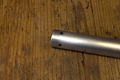 Mast tube with bracket holes drilled. (Click for larger view)