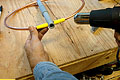Installing the heat shrink over the electrical tape. (Click for larger view)